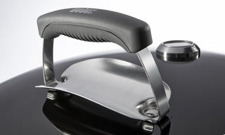 Lid handle with heat shield
